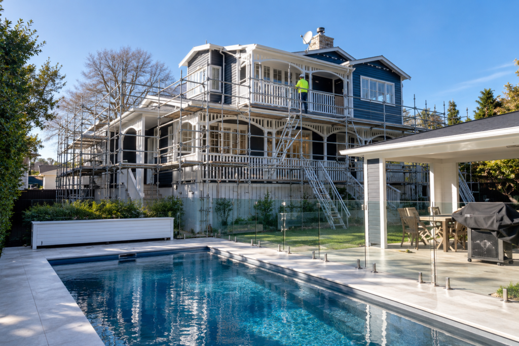A two-storey house with exterior access scaffolding
